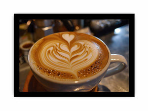 Latte art coffee canvas print with heart foam design for cozy kitchen and dining decor.