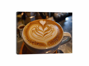 Latte art coffee canvas print with heart foam design for cozy kitchen and dining decor.