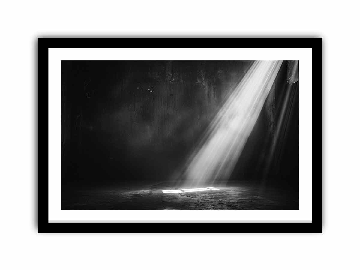 Dramatic black and white light beam entering a dark industrial room for modern living rooms decor.