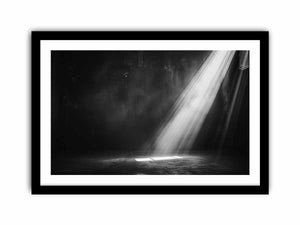 Dramatic black and white light beam entering a dark industrial room for modern living rooms decor.