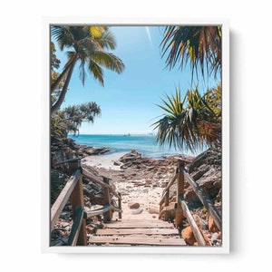 Vertical coastal beach stairs canvas print with palms and ocean for entryway decor.