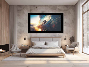 Surfer riding ocean wave canvas art for coastal living room decor.
