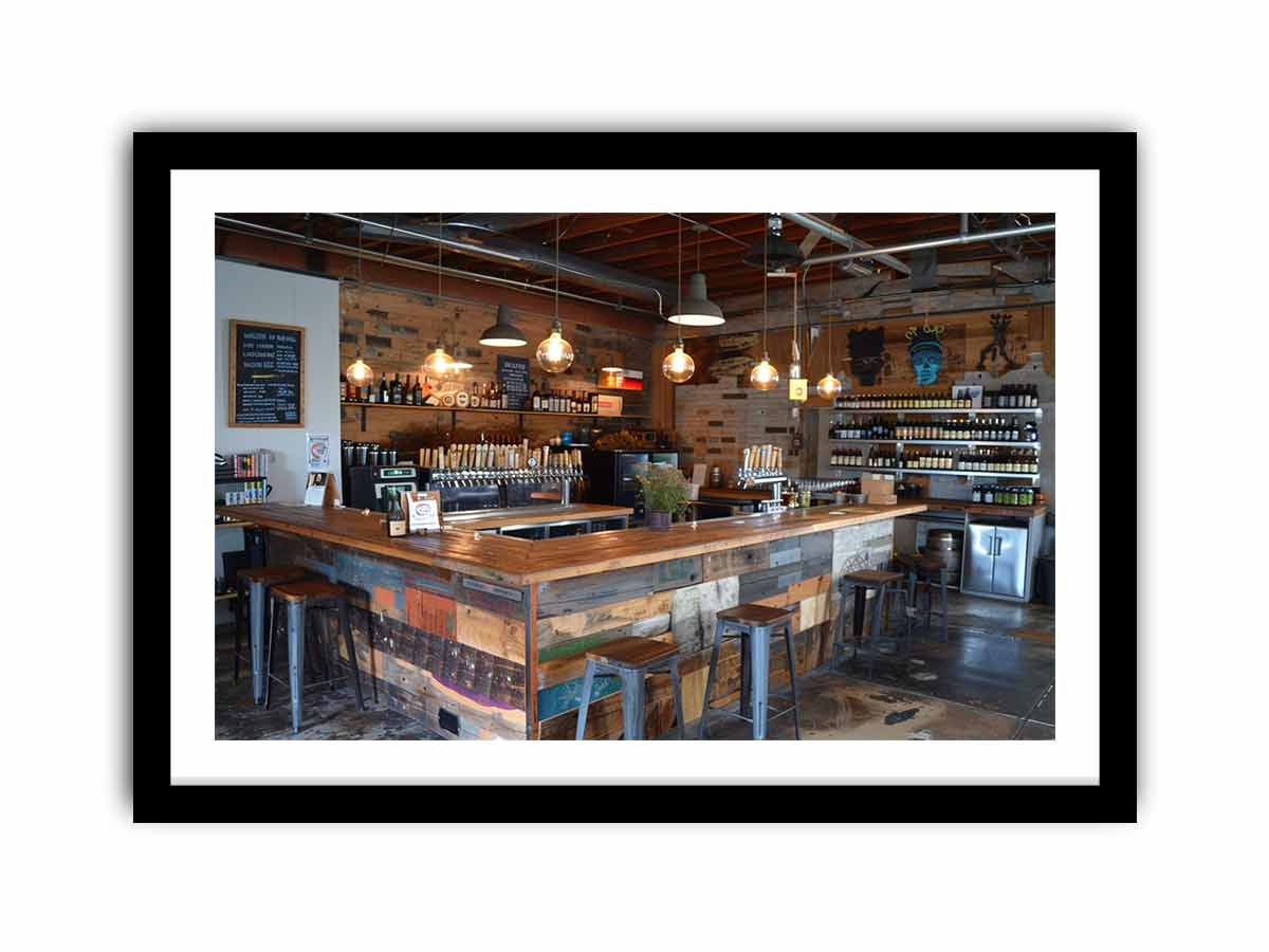 Rustic industrial bar interior canvas print for home bar decor.