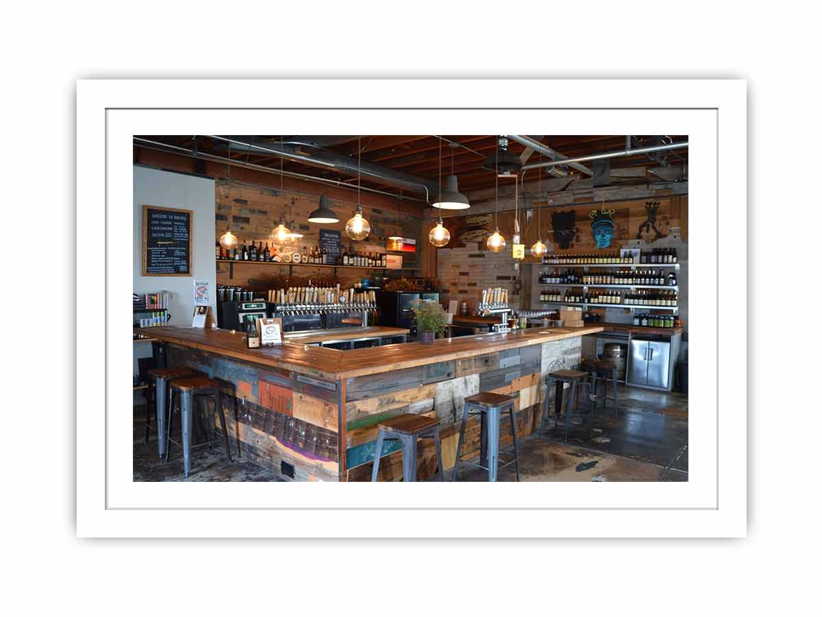 Rustic industrial bar interior canvas print for home bar decor.