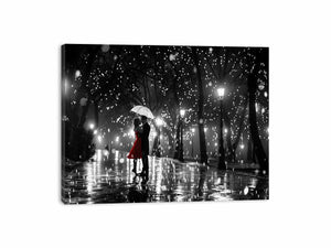 Romantic couple under umbrella canvas art with red dress for bedroom wall decor.