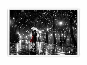Romantic couple under umbrella canvas art with red dress for bedroom wall decor.