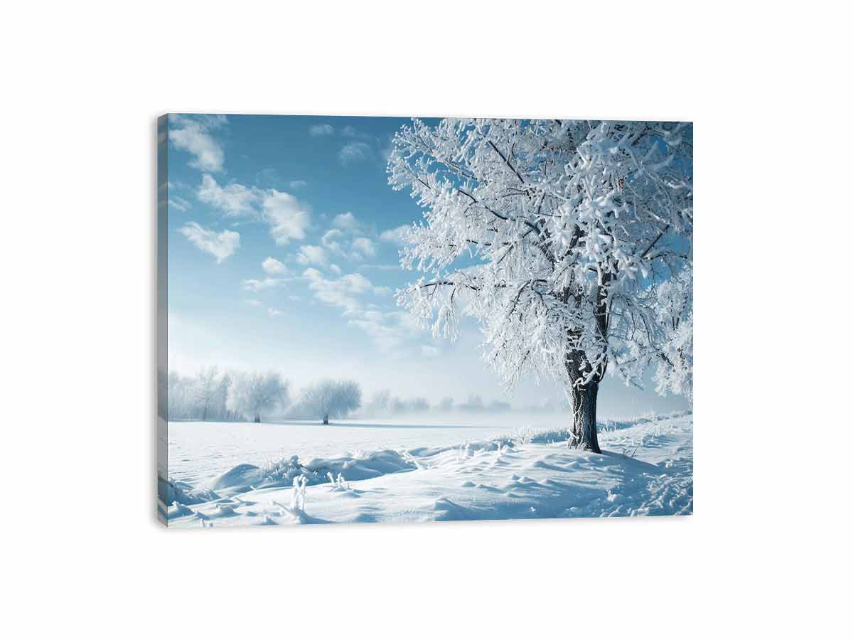 Snowy winter tree landscape canvas art for serene blue and white living room decor.