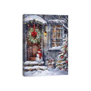 Snowy Christmas cottage doorway canvas art with wreath, snowman, and festive tree for cozy entry decor.